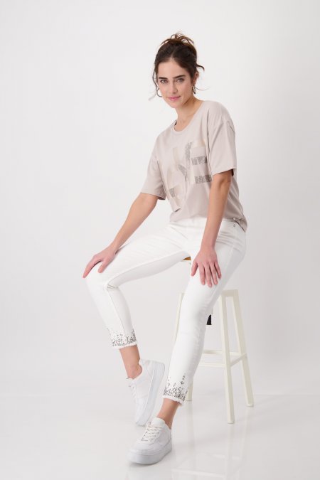 Jeans con dobladillo decorativo strass blanco MONARI - Imagen 6